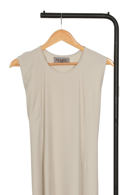 Beige sleeveless dress on a hanger with a visible brand tag against a white background